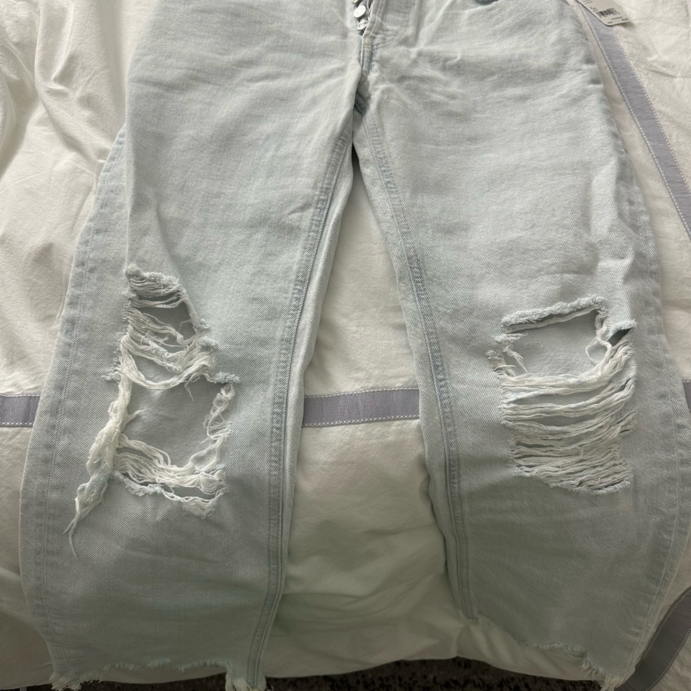 Free People light washed ripped jeans